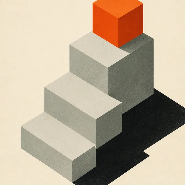 Grey steps rising to one bright orange cube on top