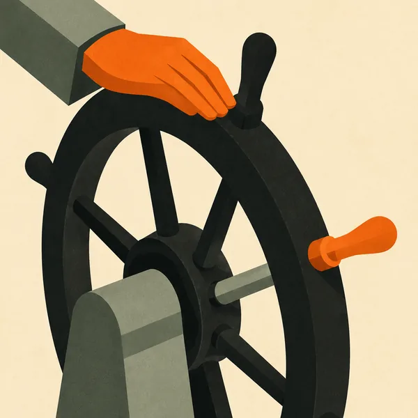 A hand resting on a ship's wheel with one orange handle